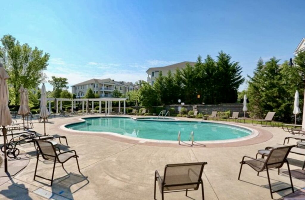 Four Seasons at Ridgemont Pool View, with the complex in the background